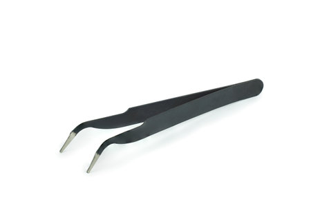 Black metal anti-static tweezers isolated over the white backgroundの写真素材