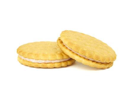 Sandwich cookies, green cream filled biscuits isolated on white background, full depth of fieldの写真素材