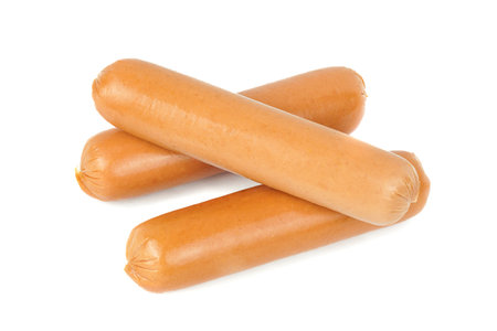 Fresh raw hot dog sausages isolated on white backgroundの写真素材