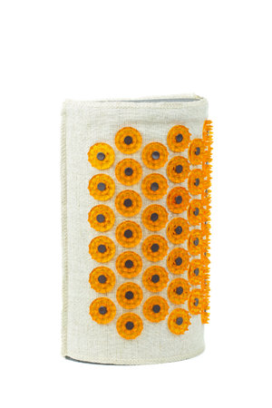 Accupuncture cushion massager-applicator. Isolated on white background.の写真素材