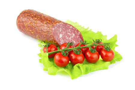 A piece of dry salami sausage, highlighted on a white backgroundの写真素材