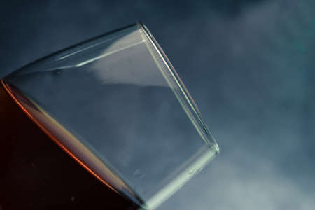 Glass of red wine close up. Beautiful dark backgroundの写真素材