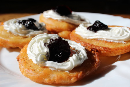 Pancakes with blackberry jam and whipped creamの写真素材