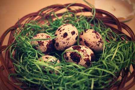Still life on the table with quail eggs.