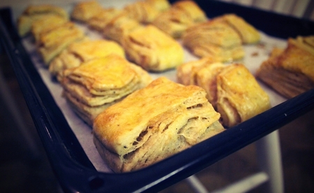 Fresh baked salty cake with cracklings on breakfast.