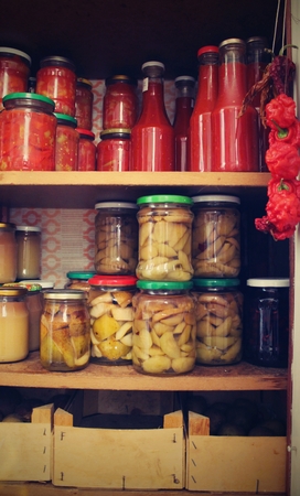 Pantry with jam in the autumn. Home made jams. Healthy home made food.の写真素材