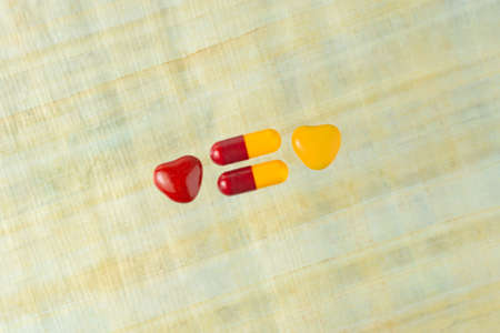 danger of poisoning children with drugs: a few tablets next to the caramel of the same color