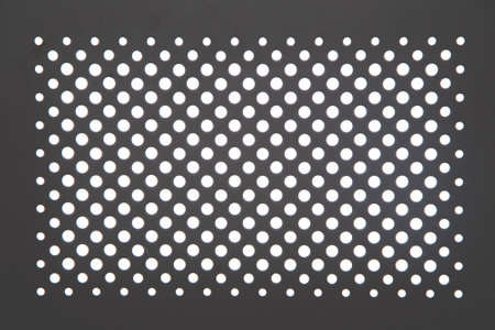 futuristic simple background: Light penetrating through symmetrical holes, defocusing, blurring,...