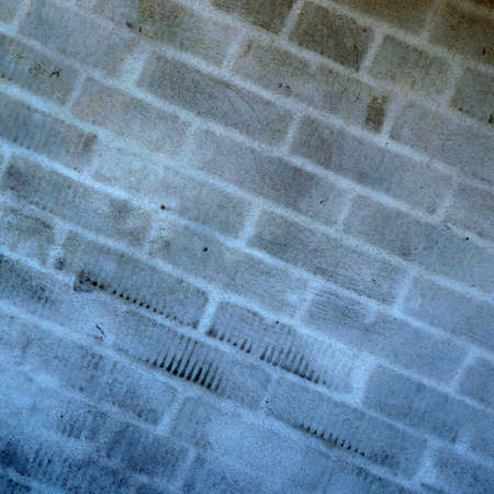 grunge background: old plastered brick wall