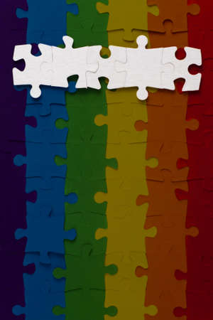 rights of sexual minorities concept: 4 white puzzle on the LGBT flagの写真素材