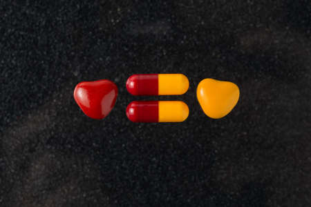 danger of poisoning children with drugs: a few tablets next to the caramel of the same color