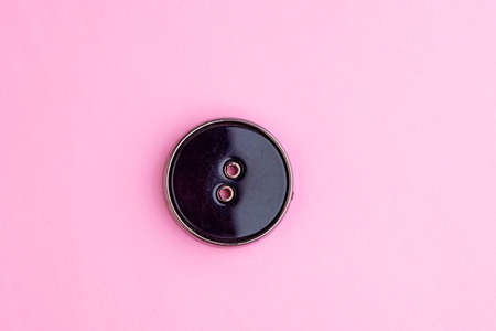 beautiful old retro button on pink background, short focusの写真素材