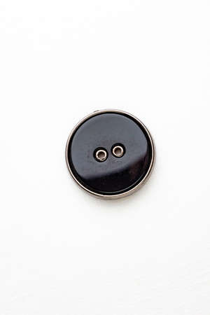 beautiful old retro button on white background, short focusの写真素材