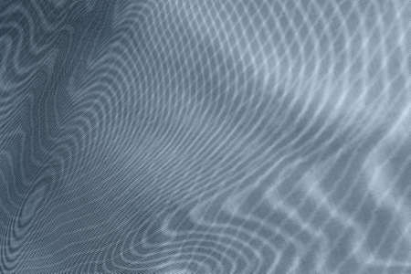 abstract background: unique wavy pattern of overlaying two grids, blurred and tinted to spruce colorの写真素材