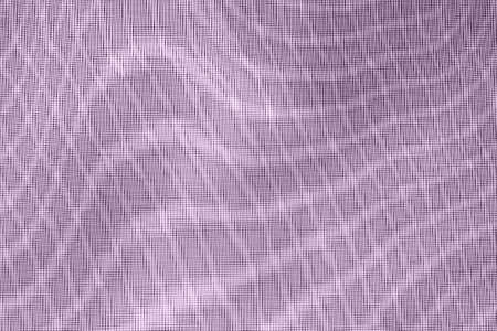 abstract background: unique wavy pattern of overlaying two grids, blurred and tinted to eggplant colorの写真素材
