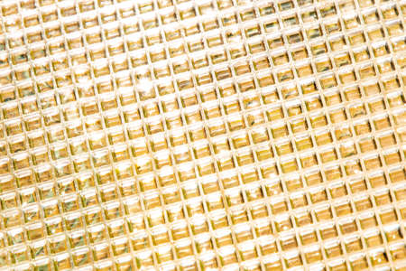abstract light golden background, curly glass, tinting, soft focusの写真素材