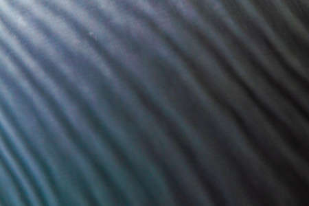 abstract colored blurred wavy background from defocused thin meshes