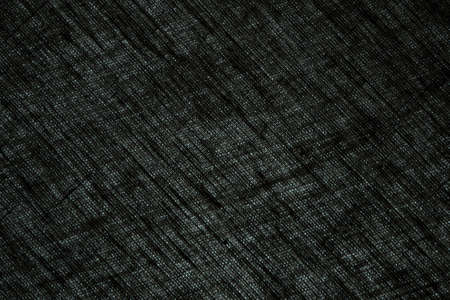 abstract rough colored linen natural fabric background, toning, short focus