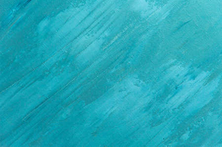 abstract colored background from stained colored oil paint on linen canvasの写真素材