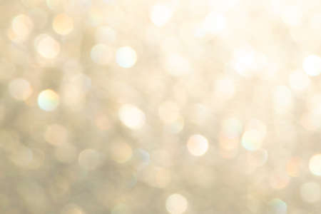 bright glitter background: bokeh effect from many colored lights on frozen glass, toningの写真素材