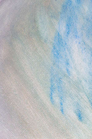 creative colored background: a temporary pattern of strokes and stains of fresh colored primer on linen linen when primingの写真素材