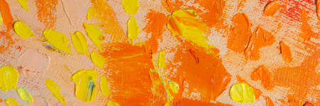 Abstract creative background: streaks and strokes of bright oil paint on linen canvas before tone...