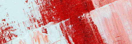 abstract creative background: white and red blurred stains of colored primer when toning the canvas,...