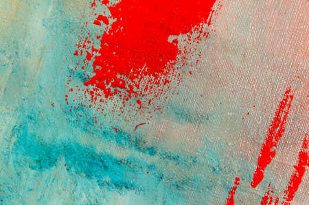 abstract creative background: red blurred stains of colored primer when toning the canvas, temporary...