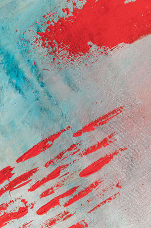 abstract creative background: red blurred stains of colored primer when toning the canvas, temporary...