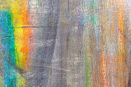 abstract rainbow multicolored background formed by erasing paints from the canvas, short focus. Not an art object, temporary effect.の写真素材