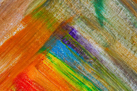 abstract rainbow multicolored background formed by erasing paints from the canvas, short focus. Not an art object, temporary effect.の写真素材