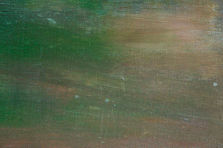 abstract colored creative background - rough linen canvas unevenly covered with multi-colored...