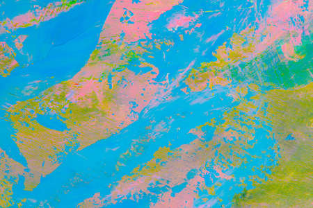 colorful creative motley background: smudged residues of oil paints on a wooden palette, short focus, selective blurの写真素材