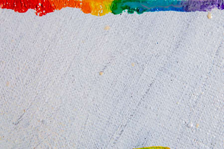 several strokes of multi-colored paint depict a frag of the LGBT community on a light surface. short focus, blur. A temporary object, not a piece of art.の写真素材