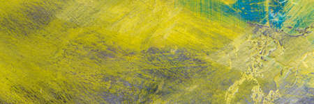 colorful creative motley background: smudged residues of oil paints on a wooden palette, short...