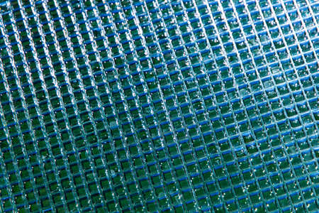 abstract dark turquoise background, curly glass, tinting, soft focusの写真素材