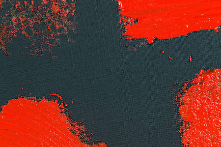 abstract creative background: red spots, strokes and splashes of colored primer when toning a black...