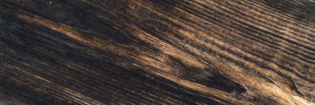 grunge background: sunburnt whitened wood surface close, cracks and dents, toningの写真素材
