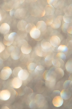bright glitter background: bokeh effect from many colored lights on frozen glass, toningの写真素材