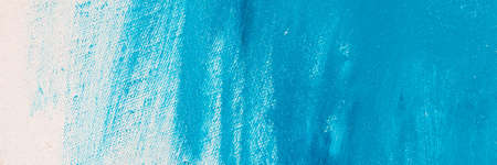 creative background, stain of colored primer rubbed on the surface of a linen canvas, temporary...