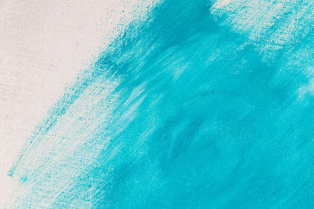 creative background, stain of colored primer rubbed on the surface of a linen canvas, temporary...