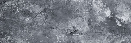 abstract creative background: rough cement plaster with spots of different tones, light color toning, short focus.の写真素材