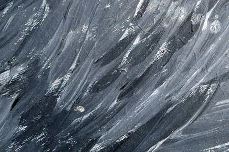 abstract creative background: roughly applied gypsum plaster, toning, short focus.