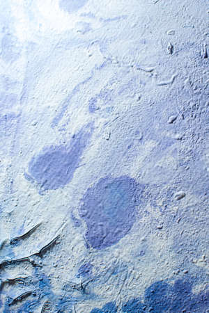 abstract creative grunge background: oil paint frozen on the palette after thinning, many cracks and...