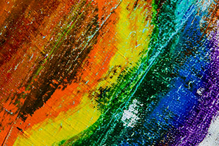 several strokes of multi-colored paint depict a frag of the LGBT community on a light surface. short focus, blur. A temporary object, not a piece of art.の写真素材