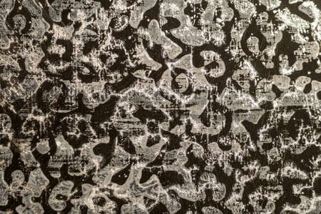 abstract creative background: figured plaster made with a pattern roller, toning, short focus.の写真素材