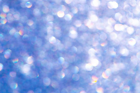 bright glitter background: bokeh effect from many colored lights on frozen glass, toningの写真素材