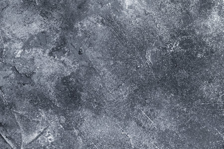 abstract creative background: rough cement plaster with spots of different tones, light color toning, short focus.の写真素材