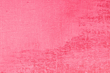 bright scarlet background: thick acrylic paint applied in a thin uneven layer on a flat surface, light and dark areasの写真素材