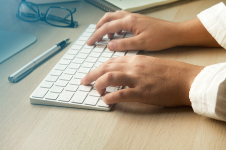 Business woman hand using computer